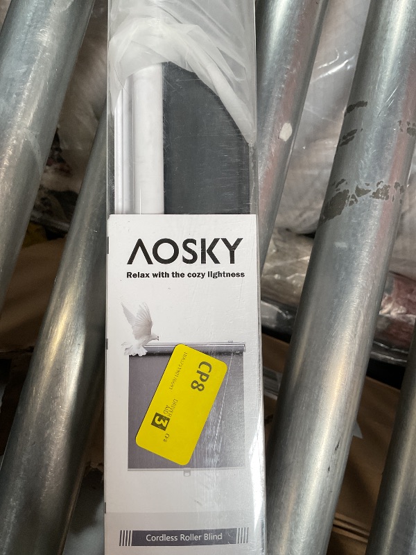 Photo 1 of AOSKY Cordless Roller Shades Blackout Blinds for Windows Room Darkening Rolled Up Shades with Spring System, UV Protection Window Shades Door Blinds for Home and Office (55" W x 72" H, Black)