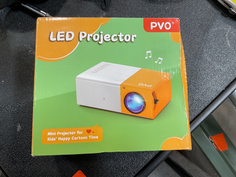 Photo 1 of PVO Mini Projector Portable For Cartoon, Outdoor Video Projectors, LED Pico Movie-Projector for Home Theater, Kids Gift, Video Can Be Easily Mirrored Directly to The Projector Via Data Cable
