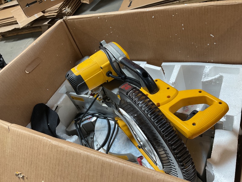 Photo 1 of **USED**DEWALT Sliding Compound Miter Saw, 12-Inch (DWS779)