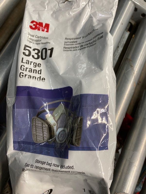 Photo 1 of 3M Black Thermoplastic Elastomer Half Mask 5000 Series Disposable Air Purifying Respirator with 4 Point Harness, English, 15.34 Fl. Oz, Plastic, 18.5" x 13.7" x 13.7"