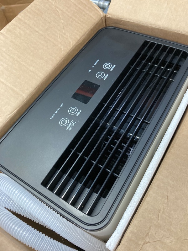 Photo 1 of Airfire Dehumidifier, 8 Pint (DOE) Dehumidifier with Drain Hose, Max 2500 Sq.Ft Dehumidifiers for Home Basement, 0.66 Gal Water Tank, Overflow Protection, Auto Defrost& Drain, Humidity Indicator
