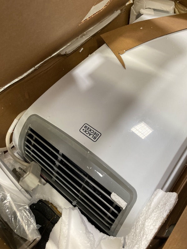 Photo 1 of BLACK+DECKER 12,000 BTU Portable Air Conditioner up to 550 Sq. with Remote Control, White