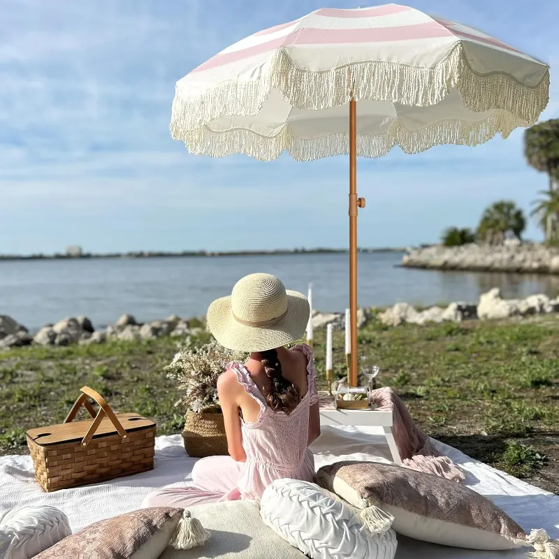 Photo 1 of AMMSUN 6.5ft Patio Umbrella UPF50+ with Boho Fringe Tassel Tilt Pole for Outdoor Picnic,Stripe Pink
