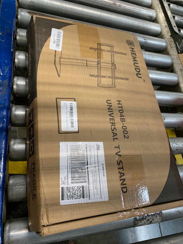 Photo 1 of Universal Swivel TV Stand/Base Table Top TV Stand 32 to 65 inch TVs 80 Degree Swivel, 4 Level Height Adjustable, Heavy Duty Tempered Glass Base, Holds up to 88lbs Screens, HT04B-002