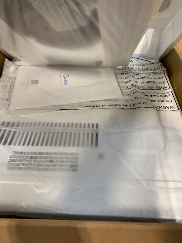 Photo 1 of Midea 12,000 BTU Smart Inverter Air Conditioner Window Unit with Heat and Dehumidifier – Cools up to 550 Sq. Ft., Energy Star Rated, Quiet Operation, Electronic Controls, Remote Control, White