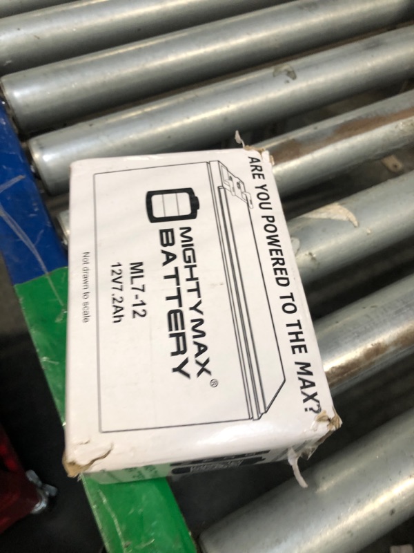 Photo 1 of  *** USED *** ML7-12 - 12 VOLT 7.2 AH SLA BATTERY - Mighty Max Battery brand product, black