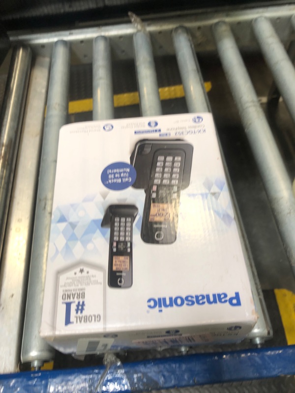 Photo 1 of Panasonic Expandable Cordless Phone System with Amber Backlit Display – 2 Handsets – KX-TGC352B (Black). 