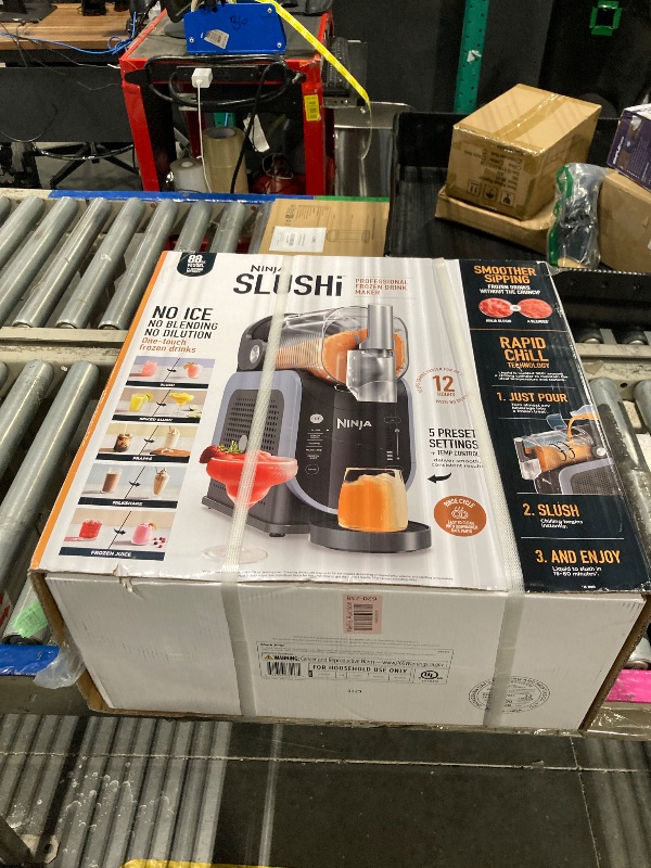 Photo 1 of **FACTORY SEALED-STRAPS STILL FULLY IN TACT**
Ninja SLUSHi with RapidChill Technology, 88 oz. Frozen Drink & Slushie Machine, 5 Preset Programs, Margaritas, Frappés, and More, Premium Accents, Black, FS301