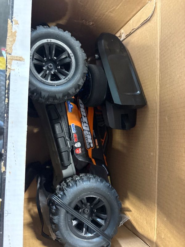 Photo 1 of 1:16 Scale 4X4 RC Trucks by BEZGAR - All Terrain, Waterproof, High Speed Electric Remote Control Cars with Upgrade Chassis and Two Batteries