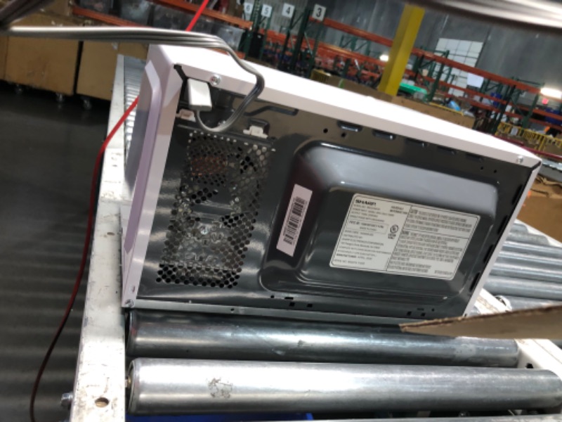 Photo 1 of ***FOR PARTS ONLY - MAJOR DAMAGE - SEE COMMENTS***
SHARP SMC0760KW Compact Countertop Microwave Oven with Removable 10" Carousel Turntable, 0.7 Cubic Feet, 700 Watt CuFt, White