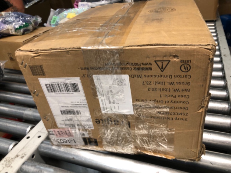 Photo 1 of ***FOR PARTS ONLY - MAJOR DAMAGE - SEE COMMENTS***
SHARP SMC0760KW Compact Countertop Microwave Oven with Removable 10" Carousel Turntable, 0.7 Cubic Feet, 700 Watt CuFt, White