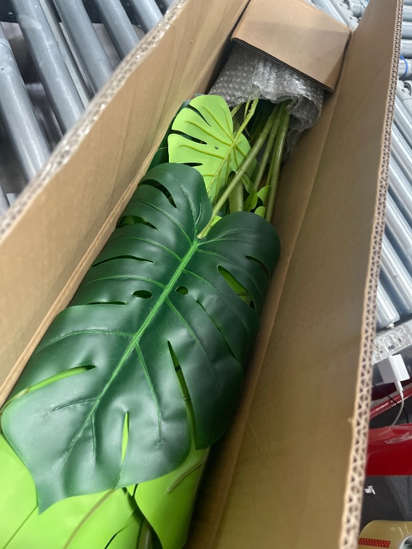 Photo 1 of Artificial Tree-Faux Plants Indoor Outdoor- Keloteven 4FT Artificial Monstera Fake Tall Tree 11 Leaves - Artificial Plants for Home Decor, Office, Living Room and Pito Decoration, MD120
