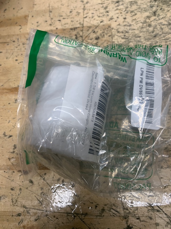 Photo 1 of 1-7/8 Vacuum Hose Coupler Accessory - Counterclockwise thread