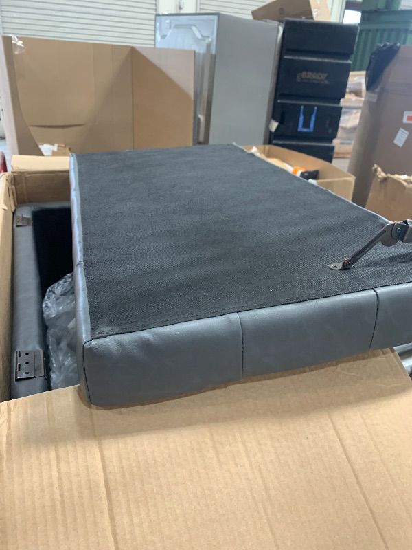 Photo 1 of **GRAY**SIMPLIHOME Cosmopolitan 34 inch Wide Transitional Rectangle Storage Ottoman in Distressed Black Vegan Faux Leather, Assembled, For the Living Room, Entryway and Family Room