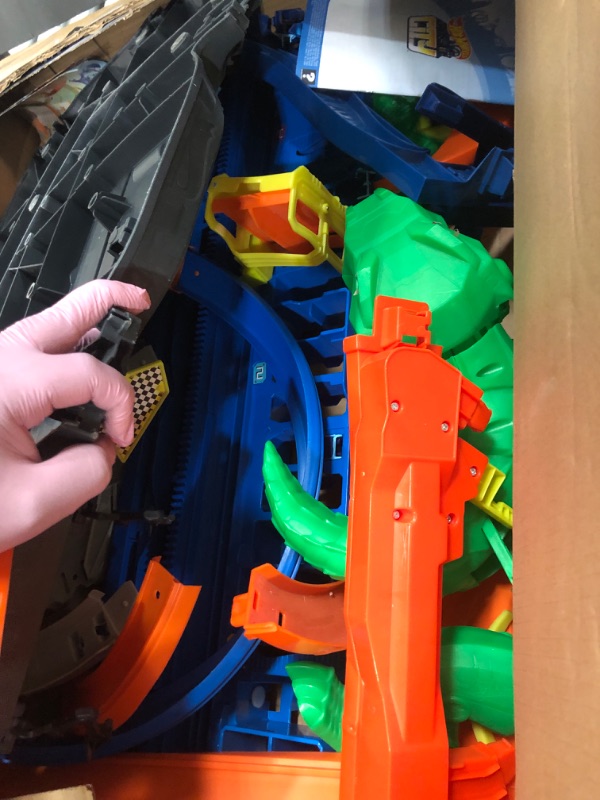 Photo 1 of ***(NO RETURNS OR REFUNDS/ FOR PARTS ONLY/ NON FUNCTIONAL)***
Hot Wheels City Toy Car Track Set, Ultimate Garage with T-Rex Dinosaur, Store 100+ 1:64 Scale Vehicles, 3-ft Tall, with 2 Cars (Amazon Exclusive)