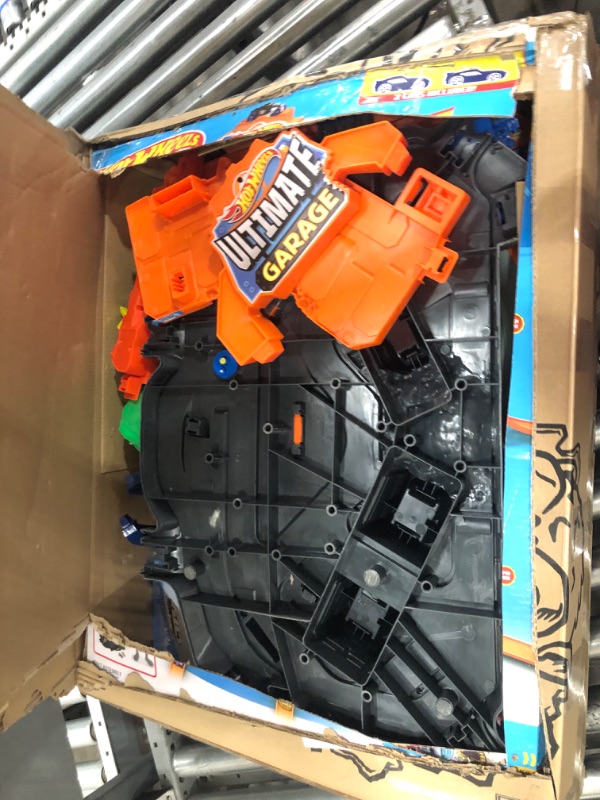 Photo 1 of ***(NO RETURNS OR REFUNDS/ FOR PARTS ONLY/ NON FUNCTIONAL)***
Hot Wheels City Toy Car Track Set, Ultimate Garage with T-Rex Dinosaur, Store 100+ 1:64 Scale Vehicles, 3-ft Tall, with 2 Cars (Amazon Exclusive)