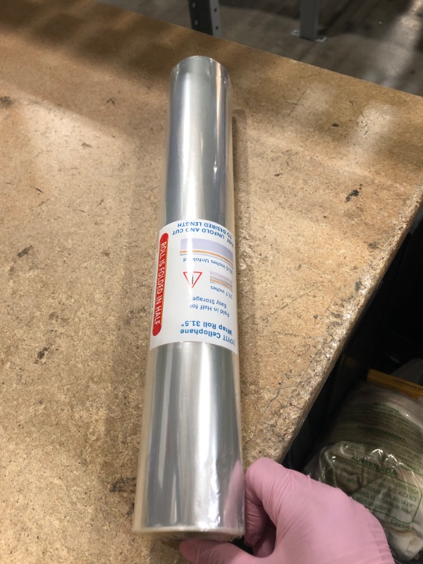 Photo 1 of 100 ft Clear Cellophane Wrap Roll (31.5 in x 100 ft) - 3 Mil Thicken Cellophane Roll, Clear Cellophane Bags Large, Clear Wrapping Paper for Flower Gift Baskets Wrap (31.5" fold into 16")