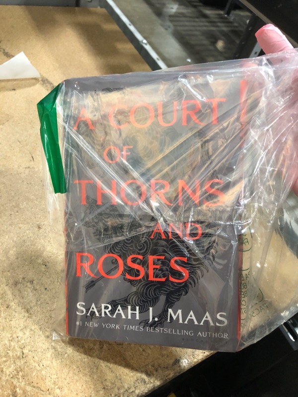 Photo 1 of A Court of Thorns and Roses (A Court of Thorns and Roses, 1) Paperback – June 2, 2020
