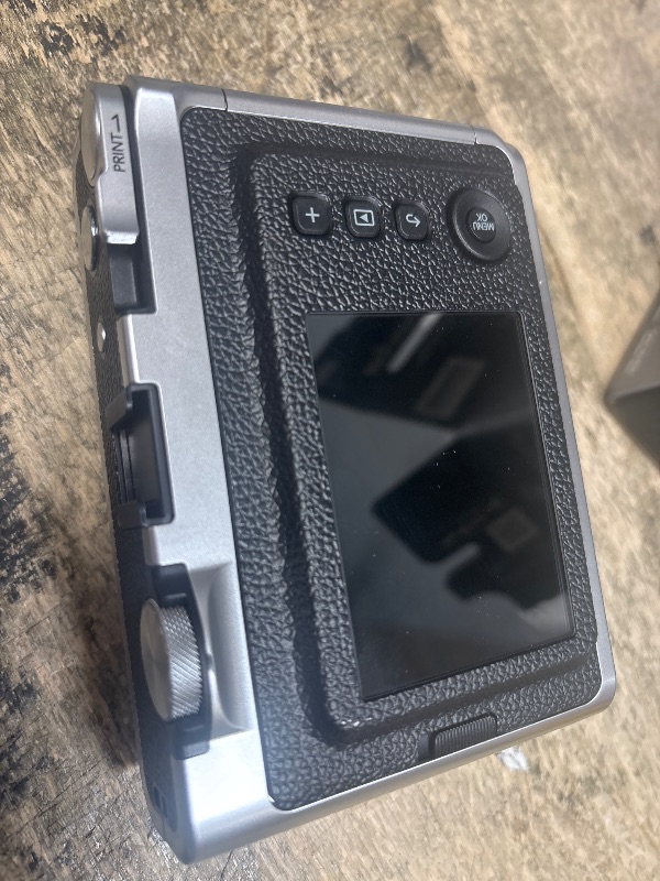 Photo 1 of Fujifilm Instax Mini EVO Instant Camera
