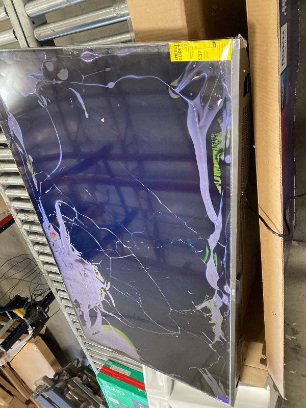 Photo 1 of **SMASHED SCREEN FINAL SALE**Roku Smart TV – 65-Inch Plus Series 4K QLED RokuTV with Roku Voice Remote Pro