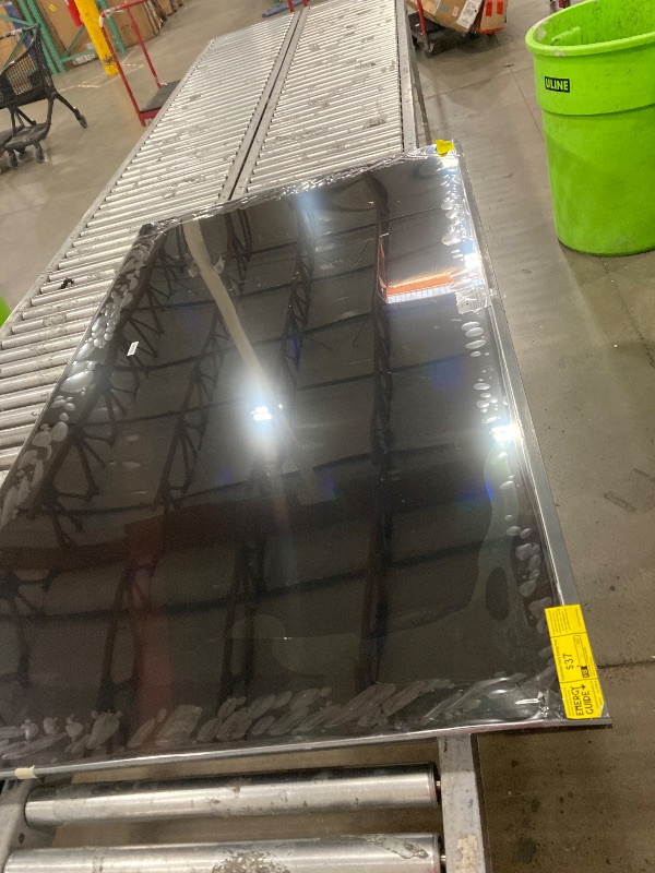 Photo 1 of **SMASHED SCREEN FINAL SALE**Amazon Fire TV 75" Omni QLED Series 4K UHD smart TV, Dolby Vision IQ, Fire TV Ambient Experience, local dimming, hands-free with Alexa
