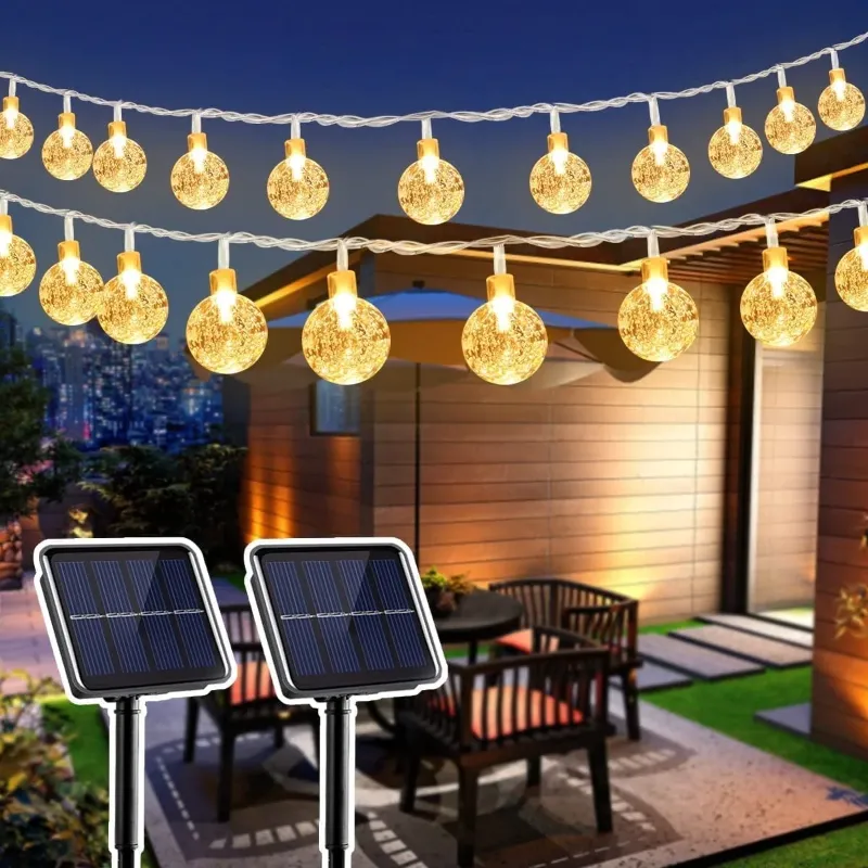 Photo 1 of 
GooingTop
GooingTop 2 Pack Solar Outdoor String Lights Waterproof,Each 30FT 60LED Crystal Globe Solar Twinkle Fairy Lights for Patio Gazebo Yard Garden Tree Outdoor Decorations(Warm White)