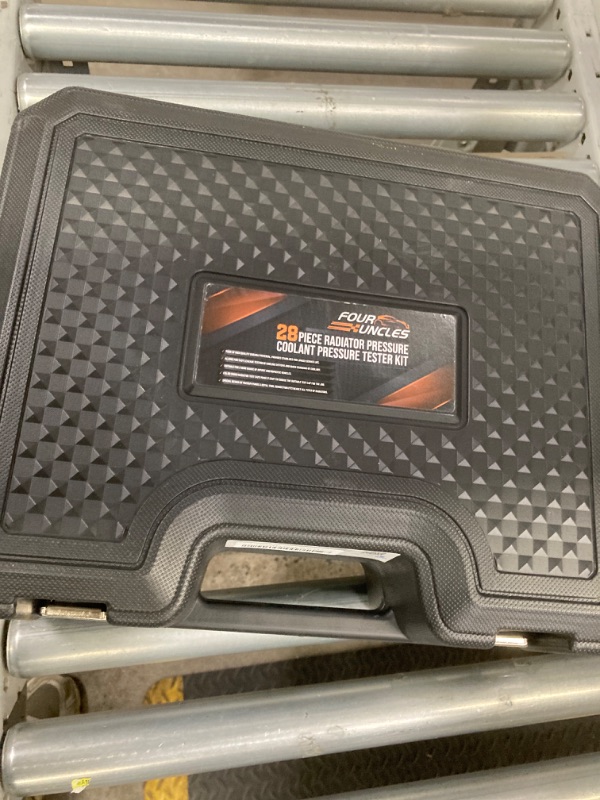 Photo 1 of FOUR UNCLES Radiator & Coolant Pressure Tester and Vacuum Refill Kit - 28-Piece Universal Cooling System Leak Tester and Refiller for Cars Motorcycles Trucks (Black)