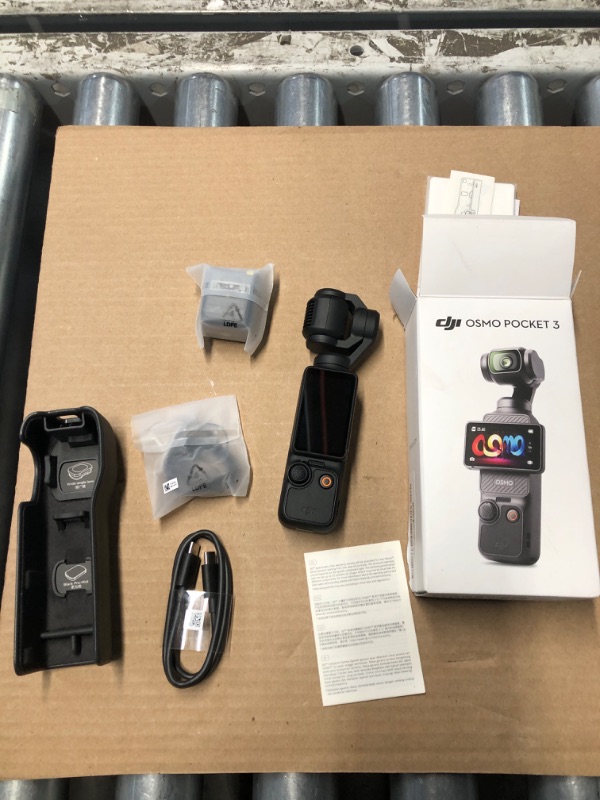 Photo 1 of ***(IMPORTANT READ NOTES BEFORE BIDDING)***
DJI Osmo Pocket 3, Vlogging Camera with 1'' CMOS & 4K/120fps Video, 3-Axis Stabilization, Fast Focusing, Face/Object Tracking, 2" Rotatable Touchscreen, Digital Camera for Photography, YouTube