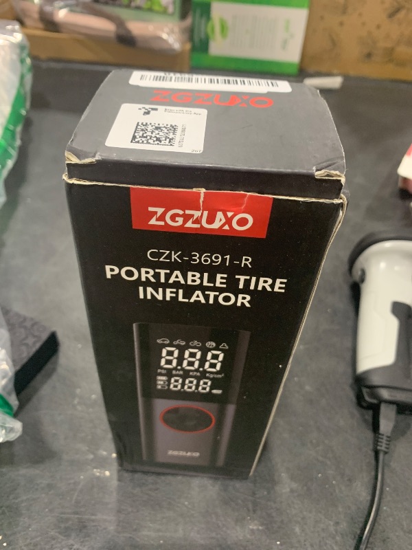 Photo 1 of ZGZUXO Tire Inflator Portable Air Compressor, 150PSI Rechargeable Air Pump for Car Tires with Battery, Cordless Tire Pump with Pressure Gauge & LCD Dual Screen, for Cars, Motorcycles, Bikes, Balls