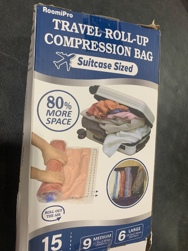 Photo 1 of 15 Compression Bags for Travel, Roll Up Space Saver Bags for Travel, Saves 80% of Storage Space for Packing & Clothes, No Pump or Vacuum Needed
