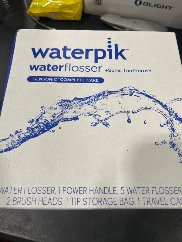 Photo 1 of Waterpik Sensonic Complete Care Water Flosser and Rechargeable Electric Toothbrush Combo Set for Teeth Cleaning and Flossing, CC-04, White, Packaging May Vary