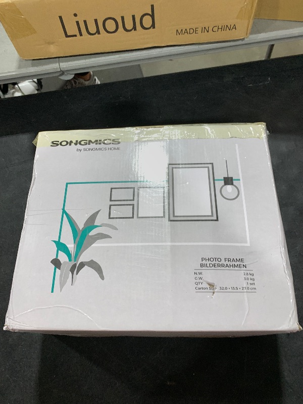 Photo 1 of SONGMICS Picture Frames with 16 Mats, Set of 10 Collage Photo Frames, Two 8x10, Four 5x7, Four 4x6 Frames, Hanging or Table Display, Glass, 12 Non-Trace Nails, Ash Black