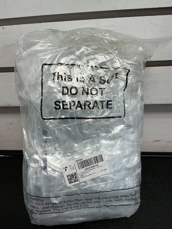 Photo 1 of LEIFIDE 50 Pcs Clear Plastic Gift Bags with Handles PVC Reusable Transparent Totes Bags for Shopping Goodie Candy School Birthday Party(5.1 x 5.9 x 2.7 Inch)