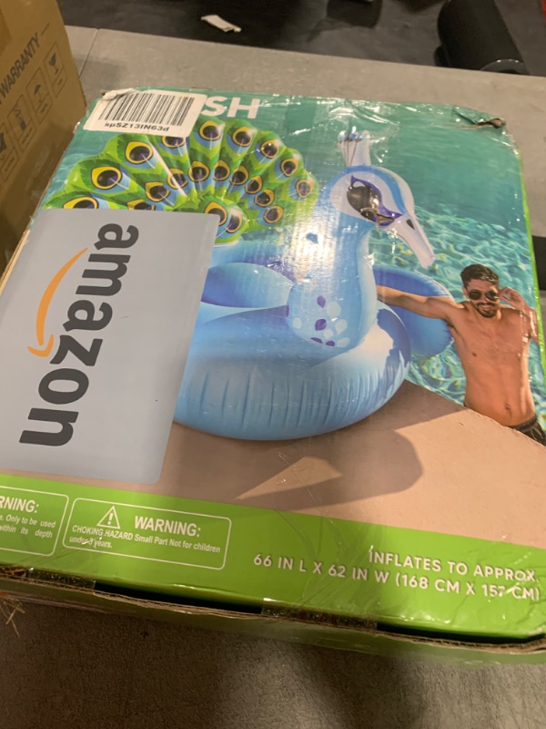 Photo 1 of JOYIN Inflatable Peacock Pool Float - Giant Blue Peacock Fun Beach Floaties, Swim Party Animal Decorations Adult Size Inflatable Summer Pool Raft Toys Lounge for Adults & Kids