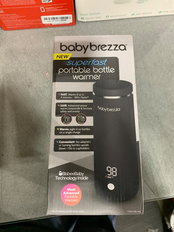 Photo 1 of Baby Brezza Superfast Portable Baby Bottle Warmer – 50% Faster - Travel Breastmilk Warmer and Formula Warmer - Safe, Even Heating - Up to 9oz - No Adapters, Black