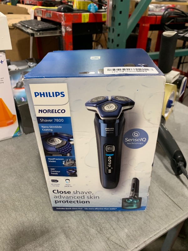 Photo 1 of Philips Norelco Shaver 7800, Rechargeable Wet & Dry Electric Shaver with SenseIQ Technology, Quick Clean Pod, Charging Stand, Travel Case and Pop-up Trimmer, S7885/85