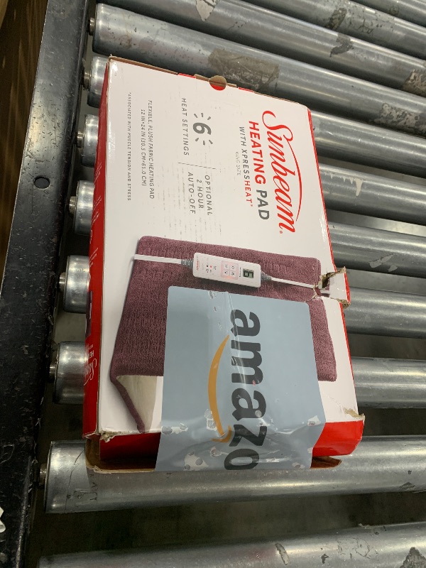 Photo 1 of Sunbeam XL Back, Neck, and Shoulder Heat Therapy, 12 x 24 with Auto Shut Off, 6 Settings, Machine-Washable, Comfortable Microplush Fabric - Burgundy