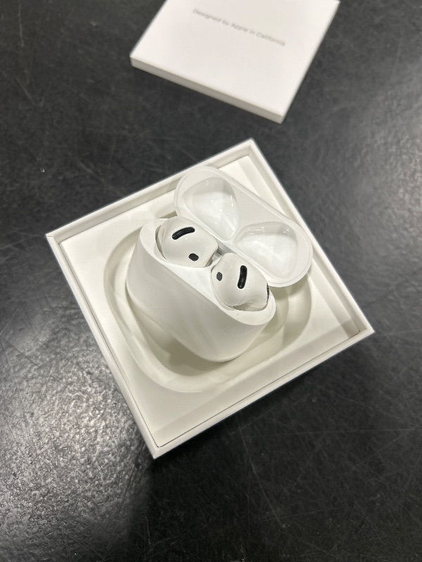 Photo 1 of Apple AirPods 4 Wireless Earbuds, Bluetooth Headphones, with Active Noise Cancellation, Adaptive Audio, Transparency Mode, Personalized Spatial Audio, USB-C Charging Case, Wireless Charging, H2 Chip