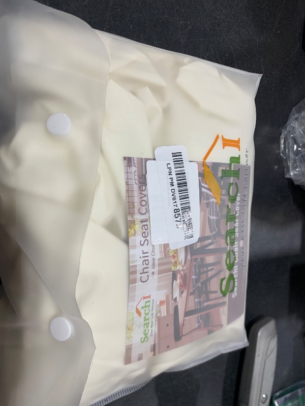 Photo 1 of SearchI Waterproof PU Leather Seat Covers for Dining Chairs, 4 Pack Stretch Dining Room Chair Seat Covers, Kitchen Chair Seat Covers Protectors (Cream)