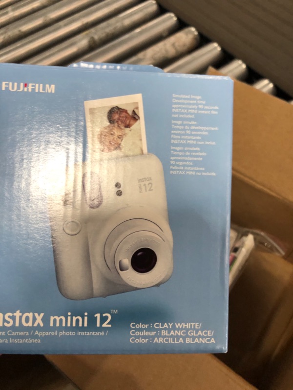 Photo 1 of Fujifilm Instax Mini 12 Instant Camera Clay White with Fujifilm Instant Mini Film Value Pack (40 Sheets) with Accessories Including Carrying Case with Strap, Photo Album, Stickers (Clay White)