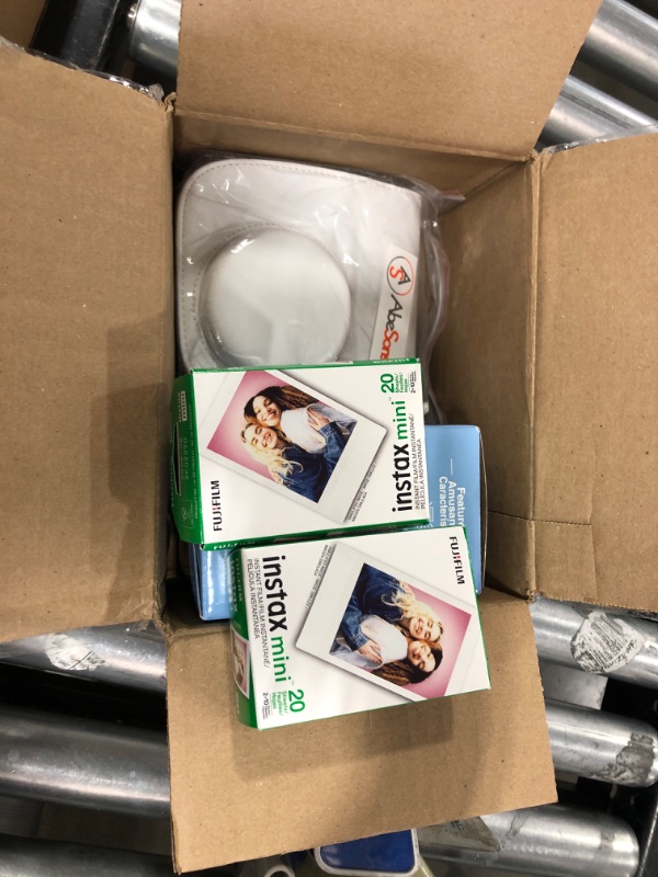 Photo 1 of Fujifilm Instax Mini 12 Instant Camera Clay White with Fujifilm Instant Mini Film Value Pack (40 Sheets) with Accessories Including Carrying Case with Strap, Photo Album, Stickers (Clay White)