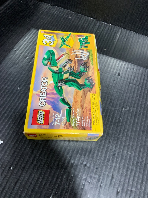 View 2 of LEGO Creator 3 in 1 Mighty Dinosaur Toy, Transforms from T. rex to Triceratops to Pterodactyl Dinosaur Figures, Great Gift for 7-12 Year Old Boys & Girls, 31058