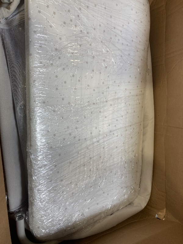 Photo 1 of White Bassinet ( has wheels ) 