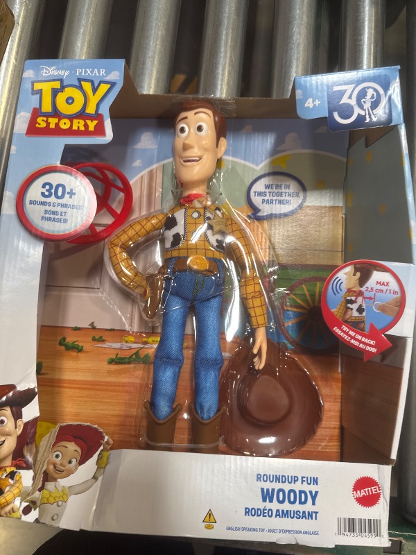 Photo 1 of Mattel Disney Pixar Toy Story Talking Woody Action Figure & Accessory, Roundup Fun 12-inch Collectible with 30+ Sounds & Phrases
