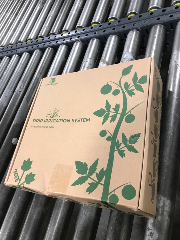 Photo 1 of CARPATHEN Drip Irrigation System - Adjustable Premium Irrigation System for Garden, Raised Beds - Complete Drip Irrigation Kit with Drip Emitters, 5/16" and 1/4" Irrigation Tubing and Barbed Fittings