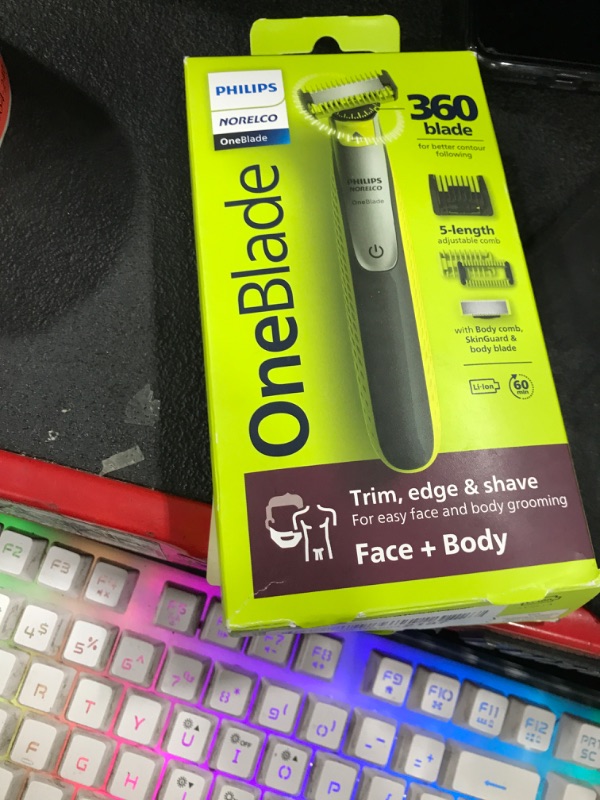 Photo 1 of Philips Norelco OneBlade 360 Hybrid Face + Body, Electric Beard Trimmer, Shaver and Body Groomer, with 360 Blade Technology, 1x 360 Blade for Face, 5in1 Adjustable Comb, 1x Body Kit, Model QP2834/70