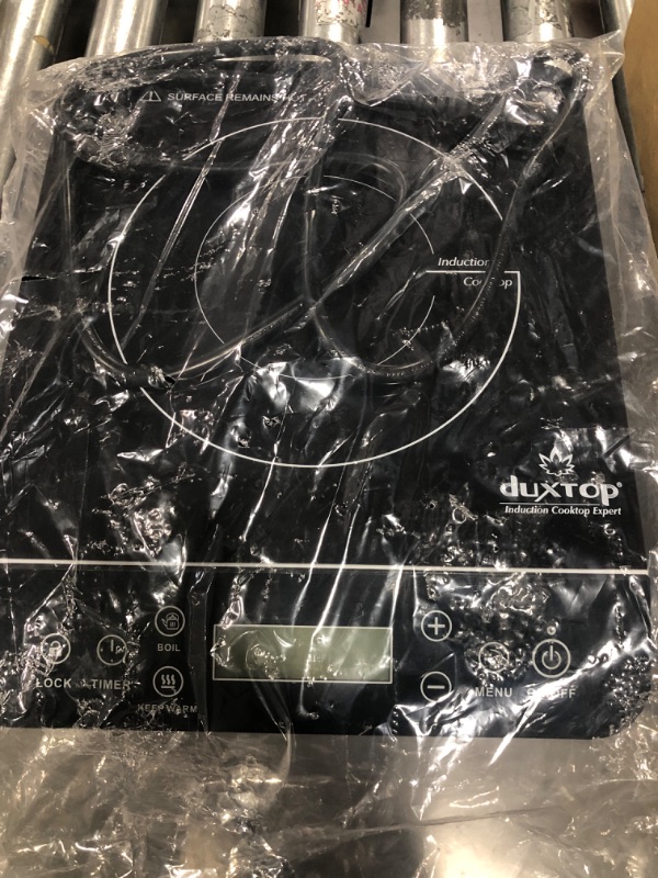 Photo 1 of Duxtop Portable Induction Cooktop Burner, Induction Hot Plate with LCD Sensor Touch 1800 Watts, Silver 9600LS/BT-200DZ