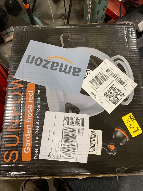 Photo 1 of SUNPOW Retractable Garden Hose Reel 1/2 Inch x 33ft - Wall Mounted Hose Reel with 3/4 Inch Brass Fittings & 10-Pattern Nozzle - Auto Rewind System, Any Length Lock, 180° Swivel Bracket