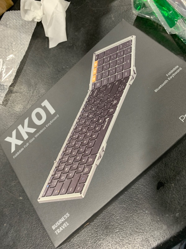 Photo 1 of ProtoArc Foldable Bluetooth Keyboard, XK01 Folding Wireless Portable Keyboard with Numeric Keypad, Full-Size Travel Keyboard for iPad Tablet Smartphone Laptop PC Windows iOS Android, Space Gray