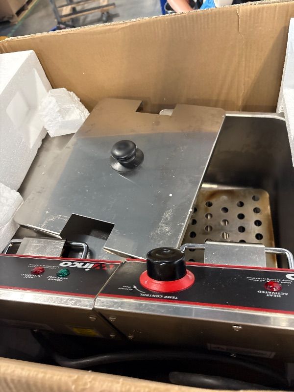Photo 1 of Winco Commercial-Grade Electric Countertop Deep Fryer, Dual Well,Silver. 